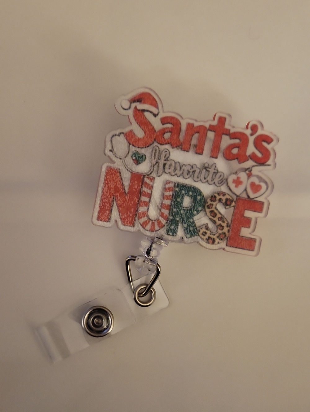 4/$25 Santa's Favorite Nurse Badge Reel